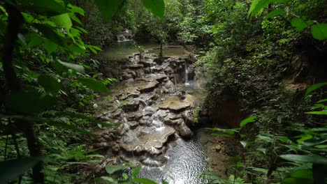 Small-Waterfalls-Surrounded-By-Greenery-In-The-Chiapas-Rainforest-Of-Mexico