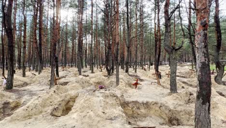 Mass-Graves-Suggest-Russian-War-Crimes-And-Genocide-In-A-Forest-In-Izium,-Ukraine-Following-The-Regions-Liberation