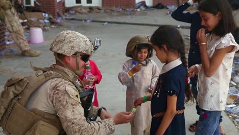 Cute-Afghan-Children-Interact-With-Us-Soldiers-As-America-Prepares-To-Evacuate-Afghanistan