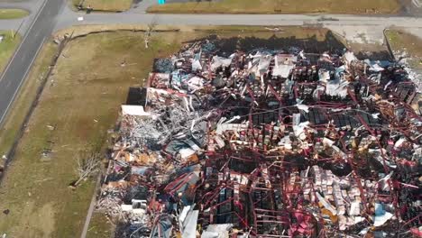 Aerial-Of-Tornado-Damage-And-The-Shocking-Destruction-Of-A-Factory-In-The-Town-Of-Dawson-Springs,-Kentucky