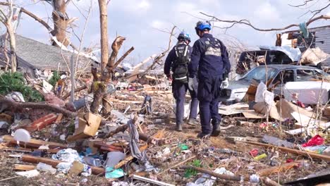 Emergency-Search-And-Rescue-Workers-Use-Cadaver-Dogs-To-Search-Rubble-Of-Dawson-Springs-After-It-Was-Destroyed-During-A-Massive-Tornado-In-Kentucky