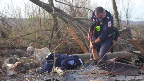 Emergency-Search-And-Rescue-Workers-Use-Cadaver-Dogs-To-Search-Rubble-Of-Dawson-Springs-After-It-Was-Destroyed-During-A-Massive-Tornado-In-Kentucky