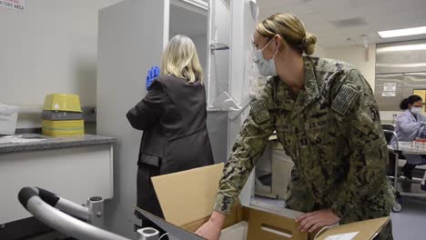 Personnel-Assigned-To-The-Naval-Medical-Center-San-Diego-Distribute-Their-First-Covid-19-Vaccine-Doses
