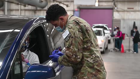 Arizona-National-Guard-Combat-Medics-Administer-One-Of-The-First-Covid-19-Pandemic-Vaccines-In-Drive-Up-Clinic