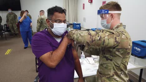 The-First-Covid-19-Pandemic-Vaccines-Are-Administered-To-Medical-Personnel-At-Womack-Army-Medical-Center