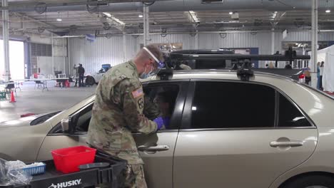 Arizona-National-Guard-Combat-Medics-Administer-One-Of-The-First-Covid-19-Pandemic-Vaccines-In-Drive-Up-Clinic