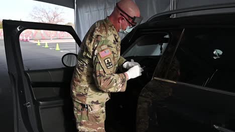 Arizona-National-Guard-Soldiers-And-Airmen-Help-Adminster-Covid-19-Pandemic-Vaccines-In-Sun-City,-Arizona