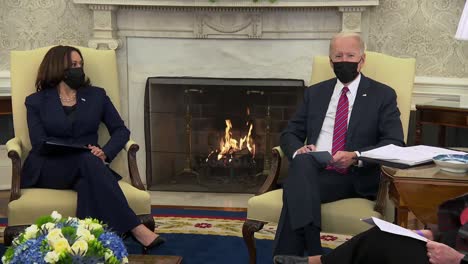 Us-President-Joe-Biden-Reads-Notes-About-Pandemic-Economic-Crisis-While-Us-Vice-President-Kamala-Harris-Sit
