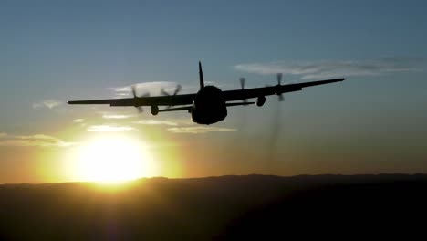 C-130-Hercules,-153Rd-Airlift-Wing,-Wyoming-National-Guard-Flys-Into-Sunset-On-A-Training-Mission