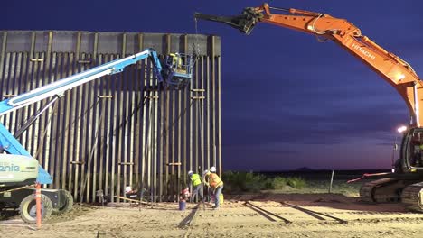 Us-Army-Corp-Of-Engineers-Installs-Section-Of-Border-Wall-Or-Border-Barrier-During-The-Night-Near-Columbus,-Nm