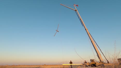 Us-zivile-Auftragnehmer-Starten-Ein-Unbemanntes-Drohnensystem-Scaneagle-In-Der-Irak-wüste-In-Der-Nähe-Von-Al-Asad