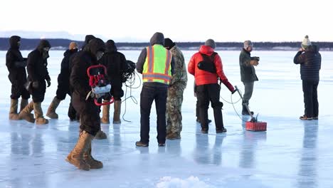 Us-Army-Paratroopers-Determine-Ice-Thickness-With-Ground-Penetrating-Radar-For-Bulldozer-Frozen-Tanana-River,-Ak