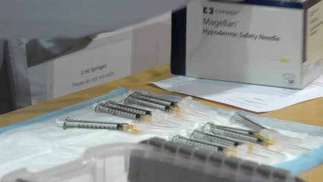 Closeup-Of-Syringes,-Needles-And-Vials-Moderna-Covid-19-Pandemic-Vaccines-Before-Innoculating-People,-Germany