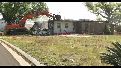 Timelapse,-Old-Housing-Tyndall-Air-Force-Base-Demolished-By-A-Backhoe-To-Make-Room-For-New-Housing