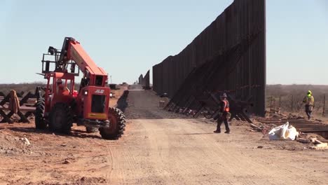 Construction-Workers,-Heavy-Equipment,-Dig-Trenches,-Border-Wall-At-El-Paso-1-Project-Span-Near-Deming,-Nm