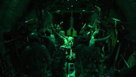 Airborne-Paratroopers-Wait-For-The-Green-Light-To-Jump-From-A-C-130J-Airplane-During-Training-Exercise-Artic-Anvil