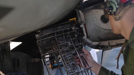 Us-Marine-Corps-Ordnance-Technicians-Remove-Munitions-From-Av-8B-Harrier-Ii,-Air-Station-Yuma,-Arizona