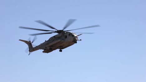 Us-Marines-Sikorsky-Ch-53E-Super-Stallion-Helicopter-Flys,-Takes-Off,-And-Lifts-Heavy-Weapons,-Military-Exercise
