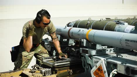 332Nd-Air-Expeditionary-Wing-Weapons-Airmen-Prepare-To-Load-Missiles,-Supporting-Operation-Inherent-Resolve
