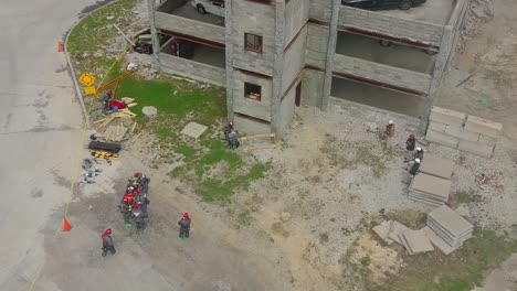 Aerial-Drone-Footage,-Urban-Search-And-Reconnaissance-Techniques-At-The-Muscatatuck-Urban-Training-Center,-In