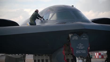 A-Northrop-B-2-Spirit-Stealth-Bomber-Ground-Crew-Inspects-And-Maintains-The-Surface-Of-The-Strategic-Jet-Bomber