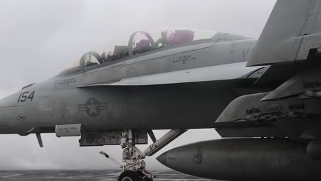 Us-Navy-Sailors-Conduct-Fighter-Jet-Flight-Operations-On-The-Flight-Deck-Of-The-Aircraft-Carrier-Uss-Theodore-Roosevelt,-(Cvn-71)
