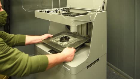 Special-Operations-Support-Squadron-Member-With-A-One-Off-3D-Printer-Fabricated-Replacement-Part