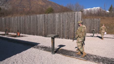 Us-Army-Soldiers-Aim,-Shoot-Pop-Up-Targets-With-M17-Small-Arms-Pistol-Marksmanship-Training,-Cao-Malnisio-Range