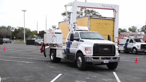 Us-Customs-And-Border-Protection-Inspects-Trucks-At-Raymond-James-Stadium,-Vehicle-And-Cargo-Inspection-System