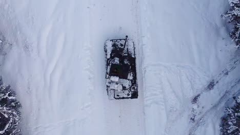 Drone-Shot,-British-Army-Challenger-2-Tanks-Drive-Through-Estonia-Forest-During-Nato’S-Exercise-Winter-Camp
