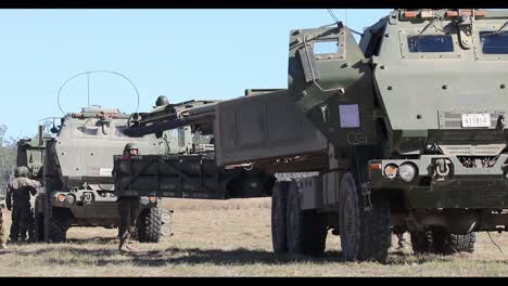 Soldiers-And-Truck-Mounted-High-Mobility-Artillery-Rocket-System-And-Himars-Weapons-System,-Exercise-Talisman-Sabre