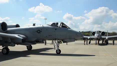 Twin-Engine-A-10-Thunderbolt-Ii-Jet-Fighter-Planes-Taxi-On-The-Tarmac-And-Runway-Before-Take-Off-From-Volk-Field,-Wisconsin