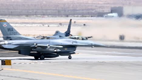 Us-Air-Force-Fighter-Jets-Taxi-And-Take-Off-In-Shimmering-Desert-Heat-During-Operation-Red-Flag-21-3,-Nellis-Afb,-Nevada