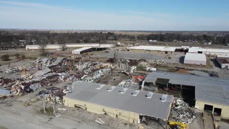 Drone-Flight-Aerial-Of-A-Rural-Industrial-Complex-Destroyed-By-High-Winds-During-A-Rare-Winter-Tornado-Event