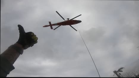 Us-Coast-Guard-Mh-65-Dolphin-Aircrew-Rescue-Operation-Near-Sanibel,-Florida-In-The-Storm-Wake-Of-Hurricane-Ian