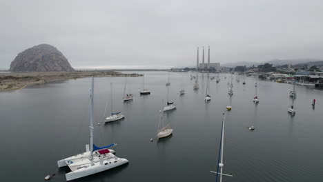 Aerial-Flying-Over-Moored-Boats-In-Marina-In-Morro-Bay-On-Overcast-Day