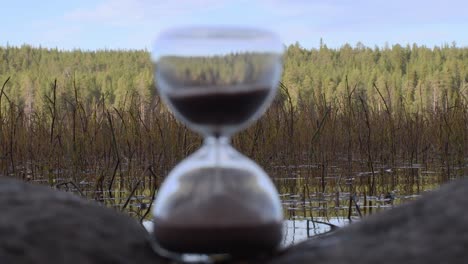 Hour-glass-sand-is-running-low-before-nature-ecological-disaster-coming-and-kill-everyone