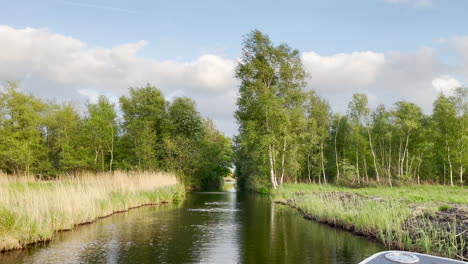 Sailing-In-Peaceful-River-In-Ossenzijl-Village-Near-Weerribben-Wieden-National-Park-In-The-Netherlands