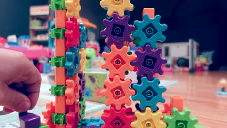 Hand-spinning-colorful-kids-gears