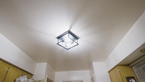 Gimbal-trick-focusing-on-a-light-fixture-in-an-old-home
