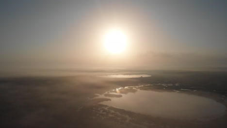Drone-flight-over-beautiful-lake-in-Mexico-during-sunrise