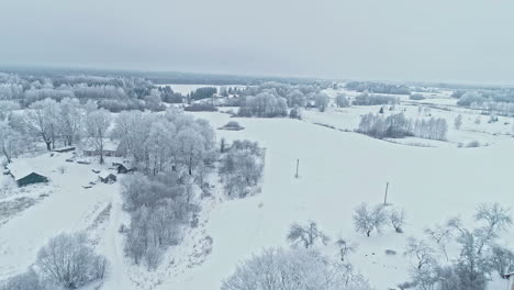 Fields-by-the-house-are-covered-with-snow-during-winter