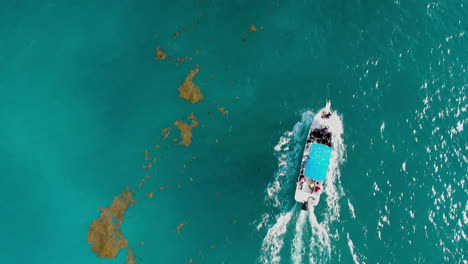 Diving-boat-sailing-out-on-Mexico-ocean-drone-shot