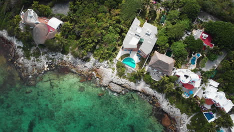Drone-flight-over-residential-tourism-hotspot-in-Mexico-at-the-beach