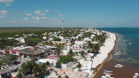 Drone-flight-over-toerist-beach-Playa-del-Carmen,-Moralis,-Mexico