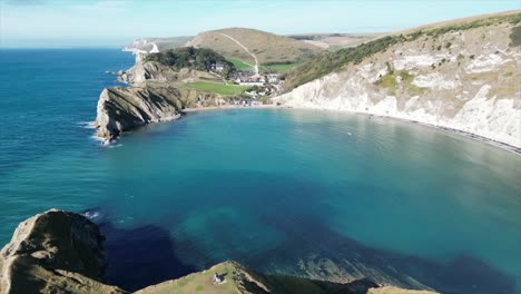 Aerial-view-of-lulworth-cave-in-England,-shore-next-to-the-English-Channel
