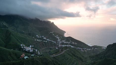 Beautiful-aerial-view-of-a-beautiful-sunset-between-the-mountains-and-the-towns-of-northern-Tenerife