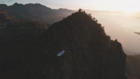 Majestic-Guatemala-mountain-and-lake-landscape-during-sunrise,-aerial-drone-view