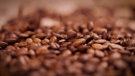 Coffee-Beans-Dropping-In-A-Pile-4K-Slow-Motion
