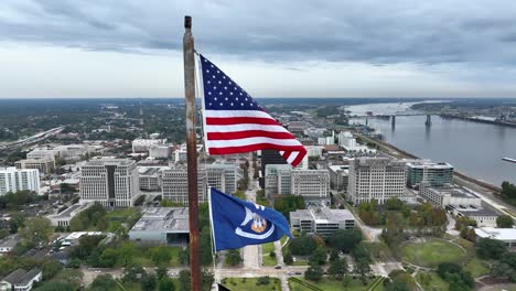 USA-and-Louisiana-state-flag-wave-in-breeze